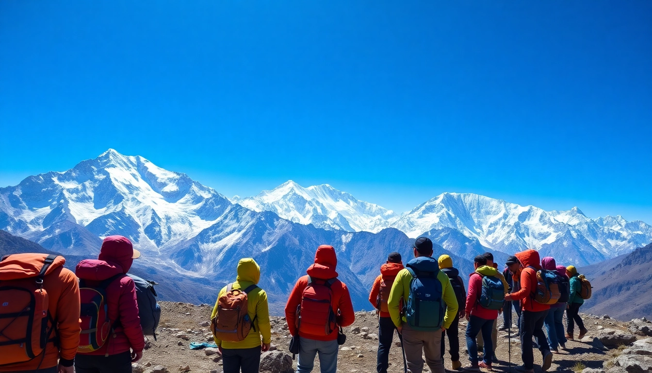 Trekkers enjoying the breathtaking views on the Sandakphu trek with Mount Everest in the background.